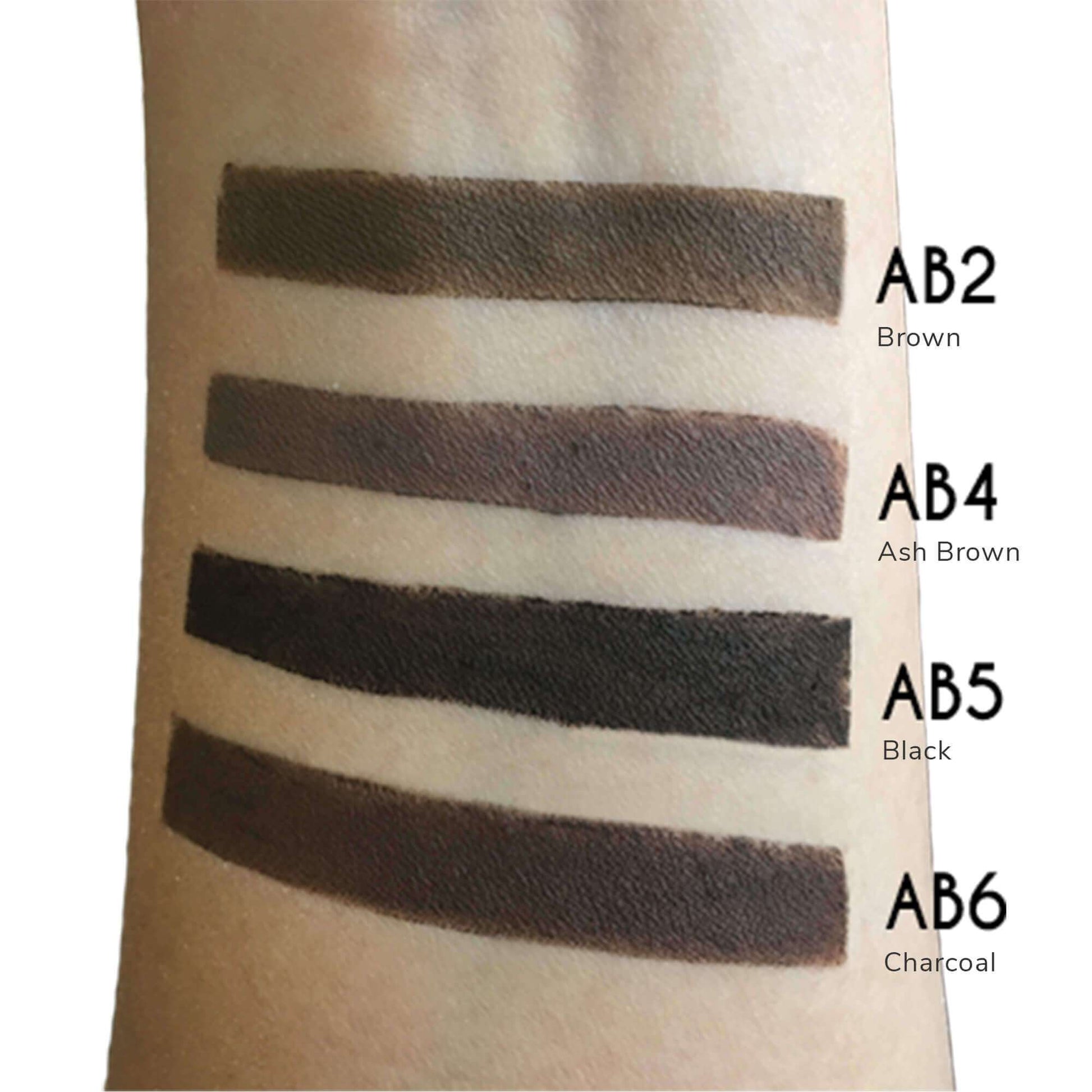 Charcoal eyebrow pencil color swatch on skin showing rich, blendable pigment